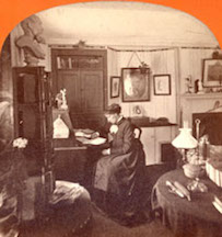Louisa May Alcott at her desk at Orchard House