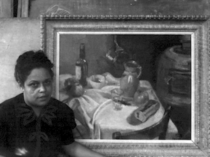 Gwendolyn B. Bennett with one of her paintings