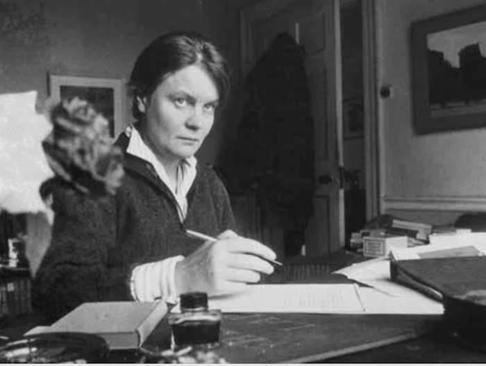 Iris Murdoch at her desk, photo by Steve Brodie