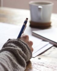 Young woman writing